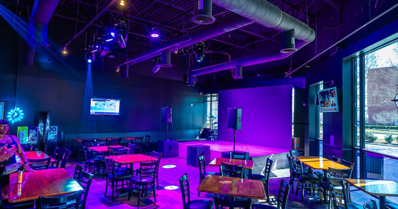 Sports bar seating area and music stage