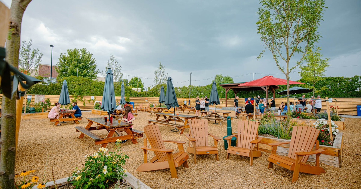 Outdoor, tables with benches waiting for the guests