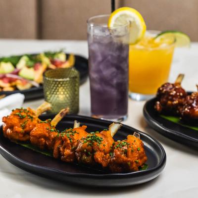 Chicken lollipops and cocktails.