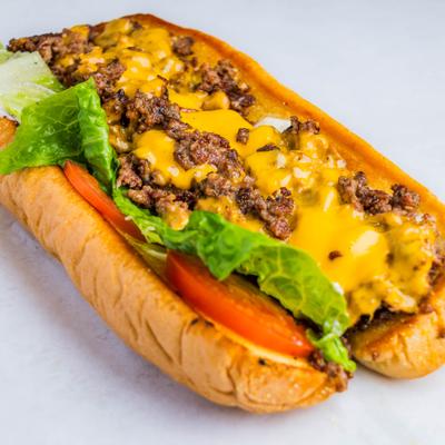 Chopped Cheese sandwich with melted American cheese, lettuce and tomato.