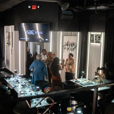 People gathered in the restaurant dining room.