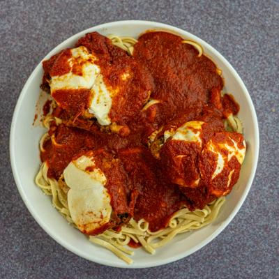Stuffed eggplant and pasta, top view.