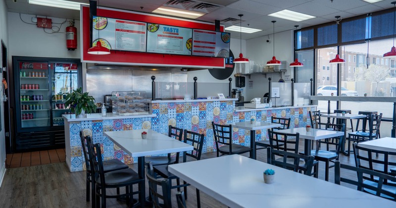 Interior, seating area, tables ready for guests