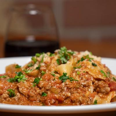 Pappardelle pasta with Bolognese sauce.