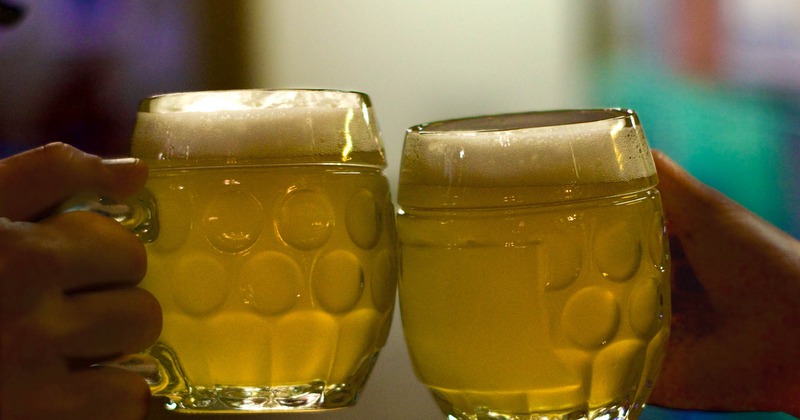 Customers toasting with beer