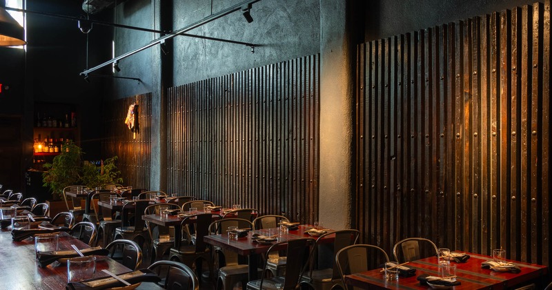 Interior,  lined up tables with chairs ready for guests