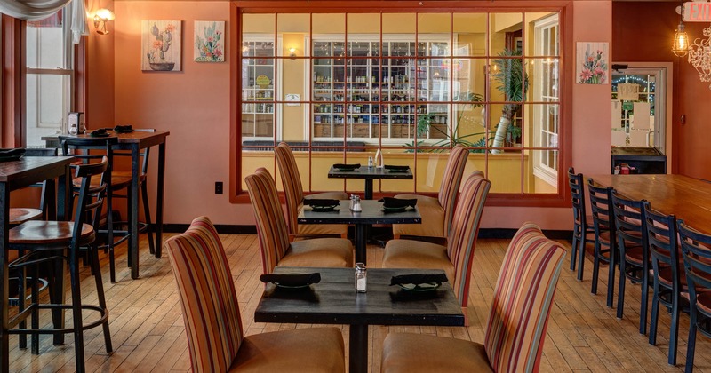Interior, tables and chairs ready for guests