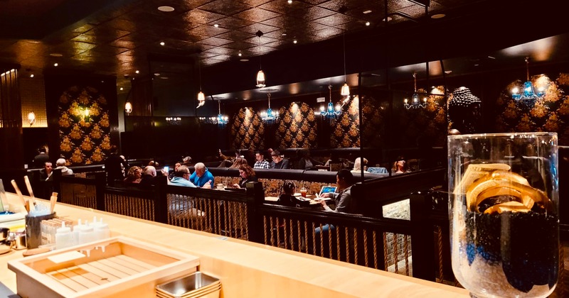 Interior, dining booths with sake barrels as decoration