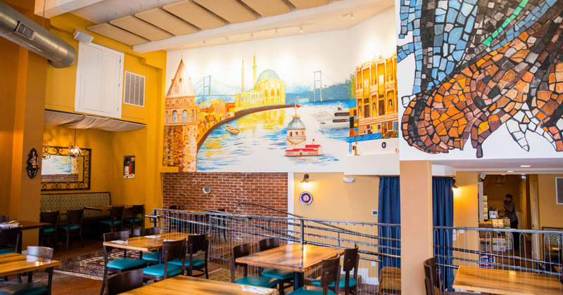 Interior, dining area with wall art, wide view