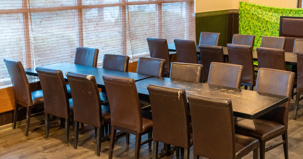 Interior, long dining tables with chairs
