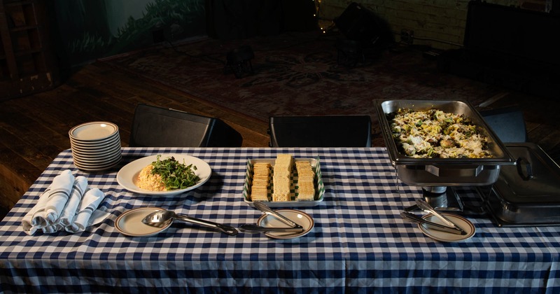 Three dishes served on a table, tableware and plates
