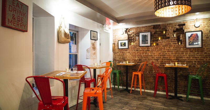 Interior space, bar tables set, prepared for guests