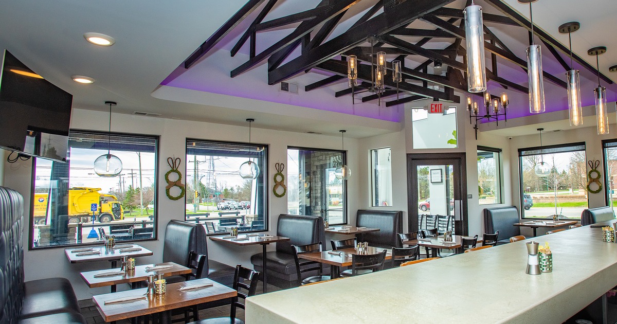 Diner area, tables, chairs, view over bar