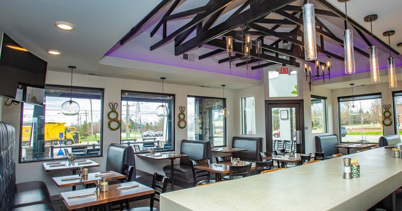 Diner area, tables, chairs, view over bar