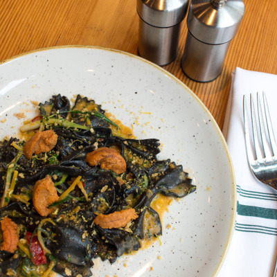 Squid ink Fettuccine with manila clams, guanciale, tomato, scallion