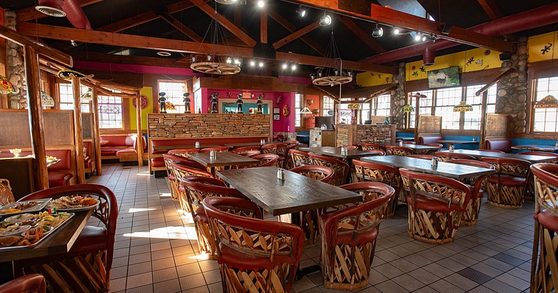 Interior, tables and chairs ready for guests