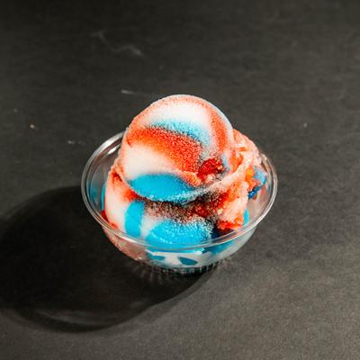 Mouth watering Italian Ice in the Rainbow flavor which is combination of Lemon, Cherry and Blue Raspberry.