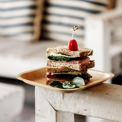 New York Pastrami sandwich with cheese and greens.