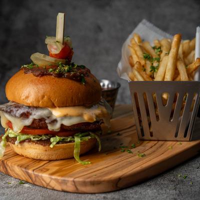 Impossible Burger served with French fries.