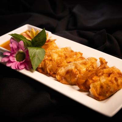 Fried dumplings, with dip.