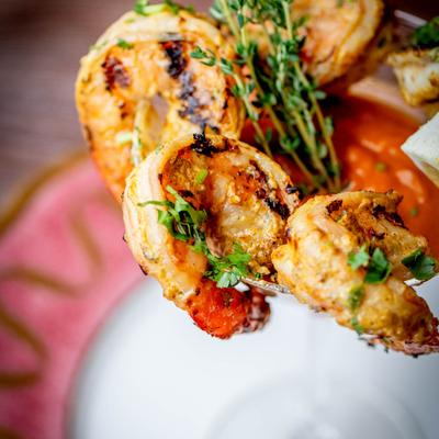 A close-up of grilled shrimp.