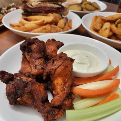 Wings. celery and sauce dip