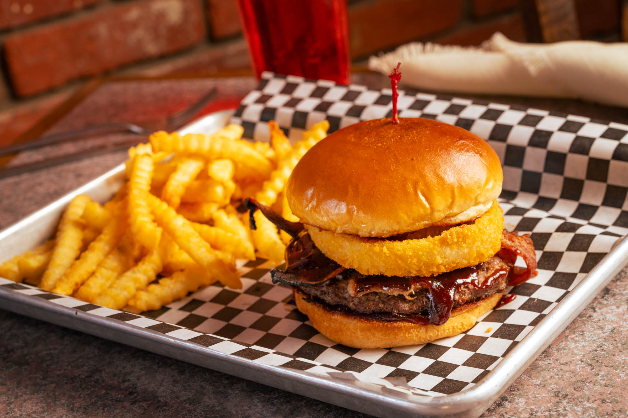 A juicy hamburger and french fries