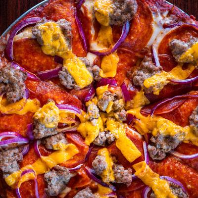 The Sharp Dressed Man Pizza, close-up.