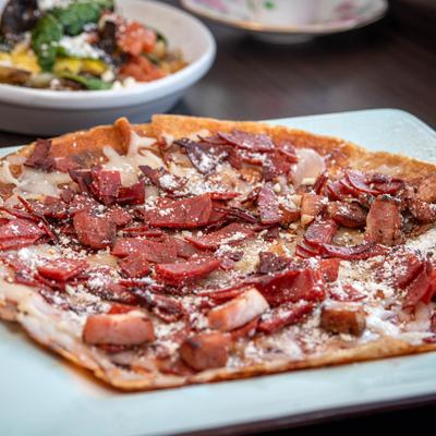 Flatbread with meats.