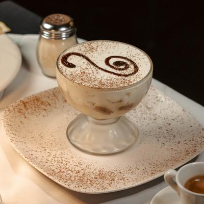 Chef-Made Tiramisu, served on the table.