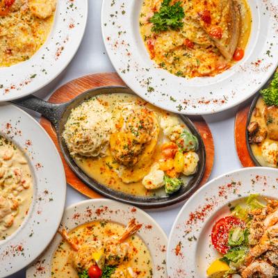 Variety of dishes served on the table, top view.