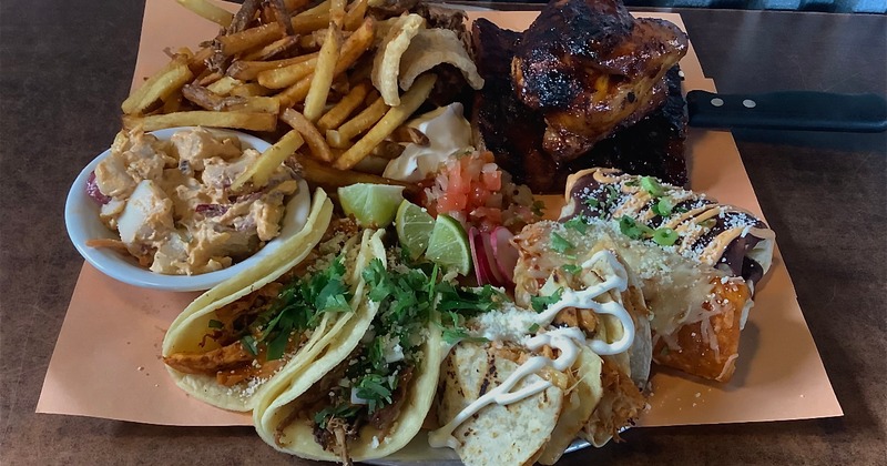 Burritos, tacos, quesadilla, ribs, brisket, smoked chicken, fries, and potato salad