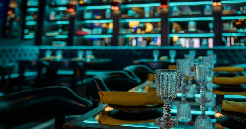 Interior, table set for guests in dining area