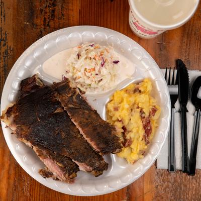 Smoked ribs, with potato salad, and coleslaw.