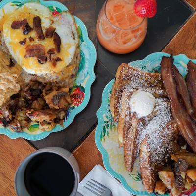 Grits Breaky plate, 185 plate with strawberry drink and coffee, top view.