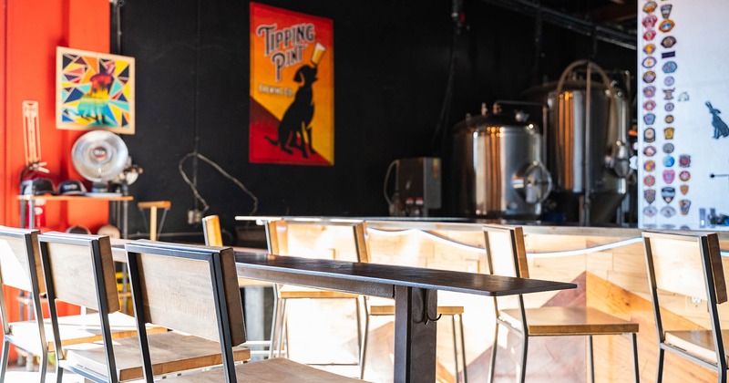 Interior, seating, tables and an area with craft beer mechanism