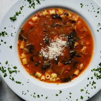A traditional Italian soup with beans, pasta, vegetables, and pork.