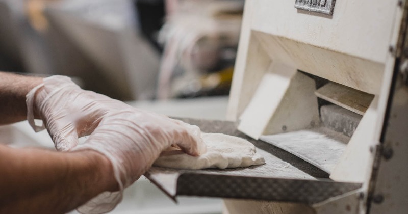 Chef making pizza dough