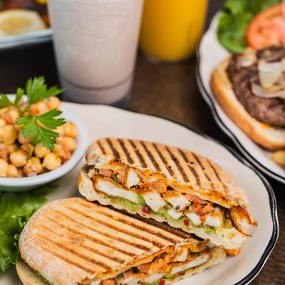 Chipotle chicken panini with chick peas salad.