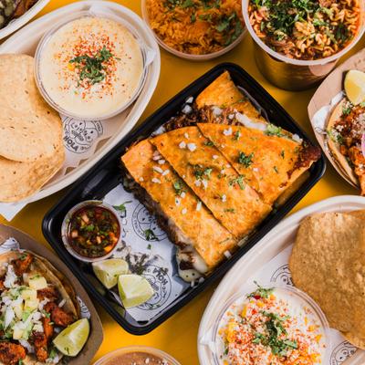 Various dishes served on the table, overhead view.