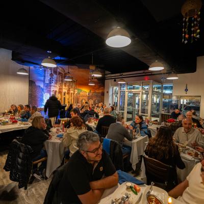 Customers dining and drinking.