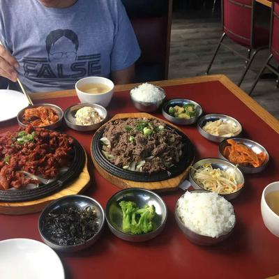 Bowls and plates with various foods.