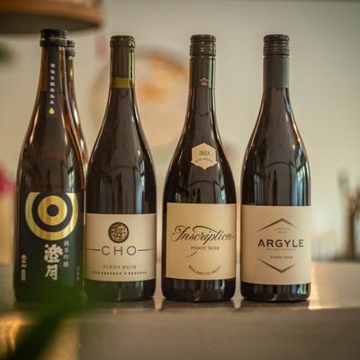 Wine bottles on a table.