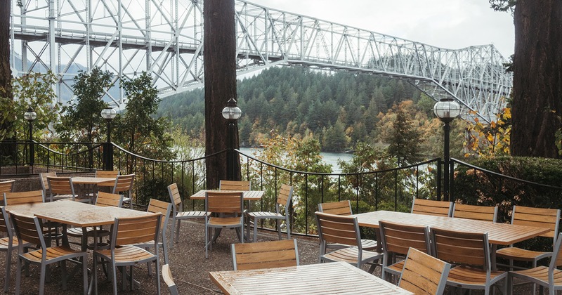 Outdoor seating area, view of the river and bridge