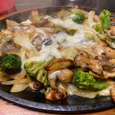 Mixed Vegetables covered in melted cheese.