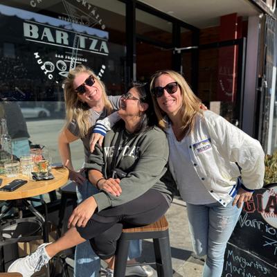 Just some regulars enjoying some sunshine and cocktails out front.
