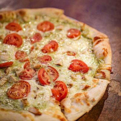 Pizza with cheese and tomatoes.