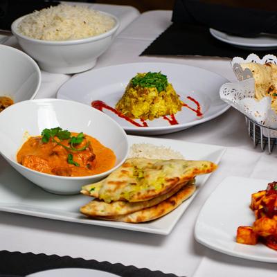 Various served meals on the table.