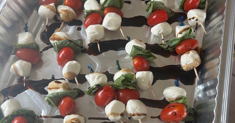 A tray with caprese skewers