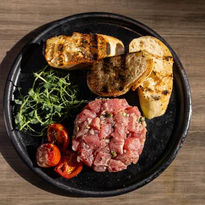 Tuna Tartare with toasted baguettes.